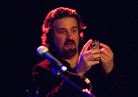 Kevin Montgomery filming the audience